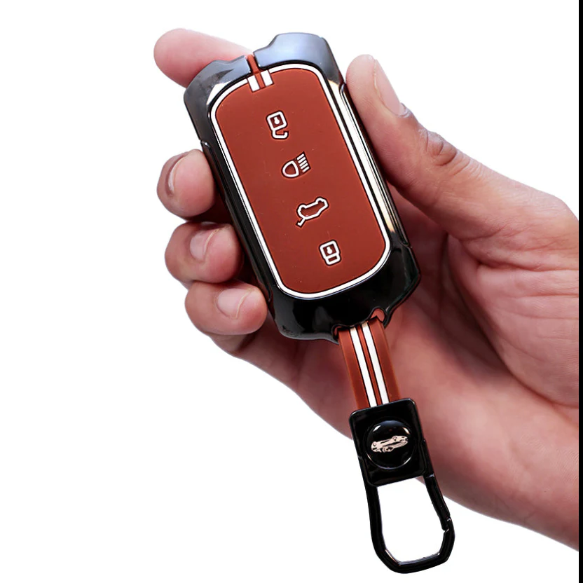 Metal Silicon Car Key Cover with Zinc Alloy For TATA Curvv - 4 Button smart key - 360° Shock-Proof Protection (Biscuit Brown)